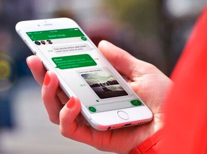 Mobile chat Smartphone in hand